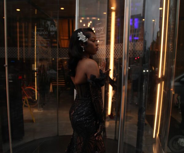 Turn every glance into admiration with this off-shoulder stunner. - Image 2